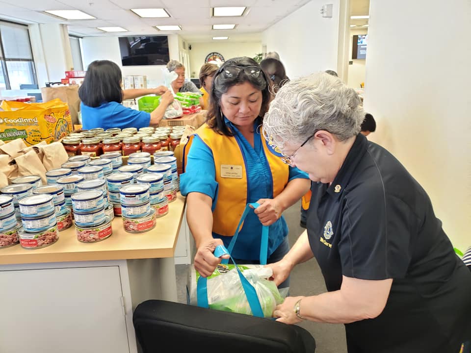 Lions assembling donation packages