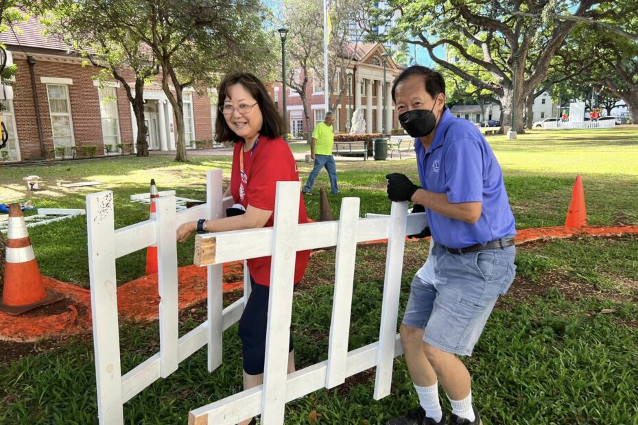 Honolulu Hale Christmas decorations take manpower to setup and to breakdown. Moanalua Lions in force to help.