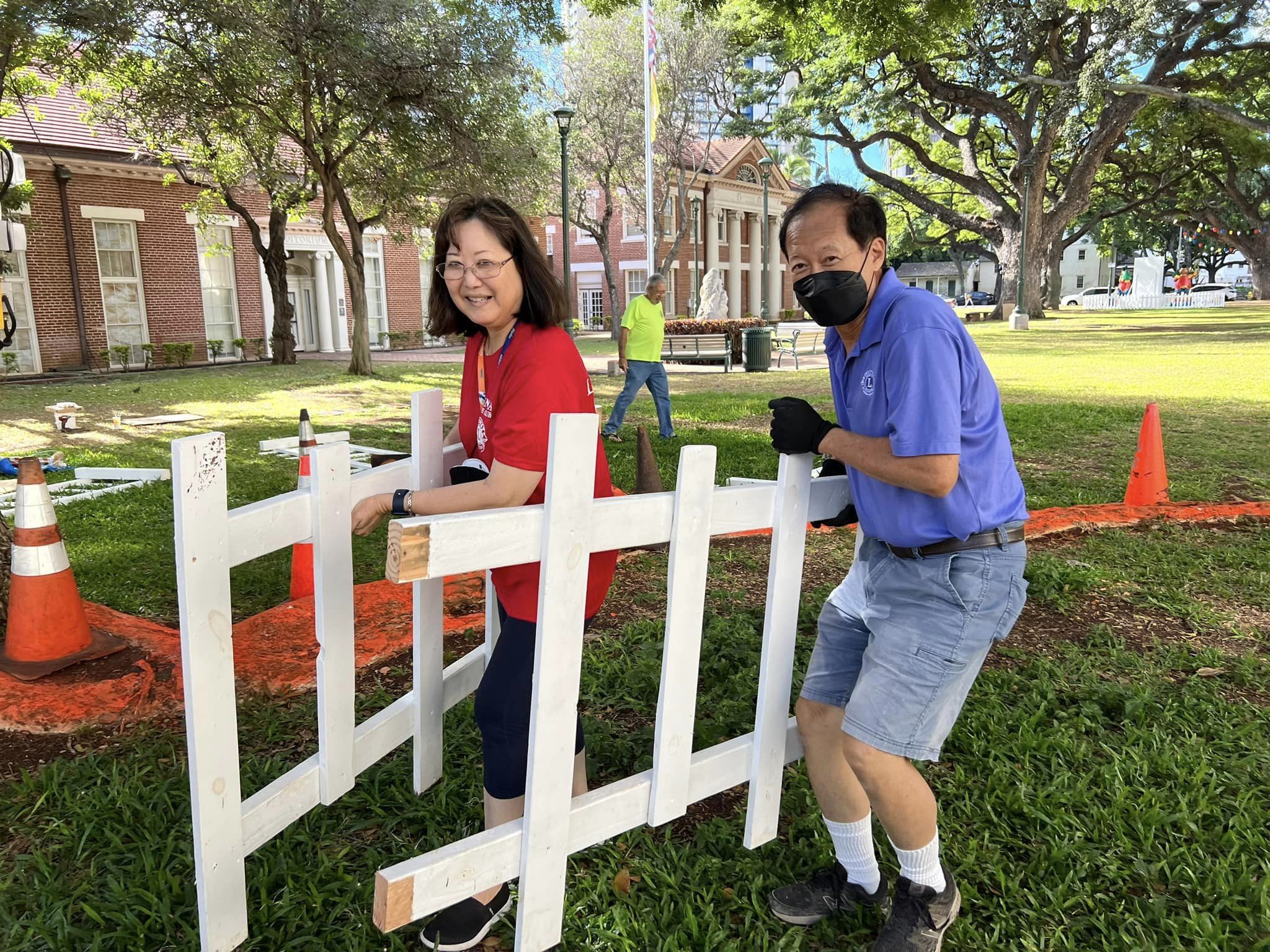 Honolulu Hale Christmas decorations take manpower to setup and to breakdown. Moanalua Lions in force to help.